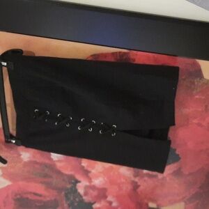 NWOT SEXY BLACK MINI SKIRT SIZE SMALL Lace Up Design Sexy Front Slit Stretchy